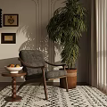 Stylish Accent Chair with Side Table Bowl of Fruits and Tall Green Plant on Rug