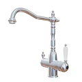 Tall Silver Kitchen Faucet with Decorative Spout and Vintage Handle Details