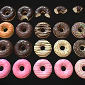 Delicious Assorted Colorful Donuts With Pink Frosting Striped Glaze And Sprinkles
