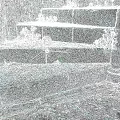 Ancient Stone Spiral Staircase With Mossy Steps Stone Walls And Green Plants