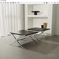 Two Modern Black Stools With Silver Metal Frame In Sleek Contemporary Room
