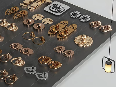 Decorative Brass Door Handles With Various Designs Displayed On Gray Table 3d model