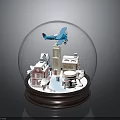 Snow Globe With Small Houses Tower Airplane And Snowflakes On Wooden Base