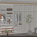 Modern Elegant White Wardrobe With Glass Doors Internal Storage Hanging Space Drawers And Decorative Plants