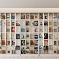 Large White Bookshelf Filled With Various Books And Decorative Artworks In Interior