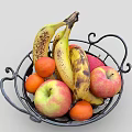 Black Wrought Iron Basket Filled With Fresh Bananas Apples And Oranges