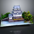 Traditional Japanese Castle with Multi Level Structure Gray Roof White Walls Surrounded By Trees Water