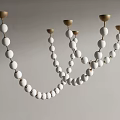 Modern Elegant Chandelier With White Spheres And Gold Bases Minimalist Hanging Design