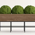 Three Round Green Bonsai Plants in Wooden Planter with Black Metal Stand