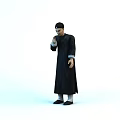 Traditional Character In Black Robe And Hat Standing Against White Background
