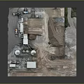 Industrial Silo Facility With Multiple White Silos Heavy Equipment And Gravel Yard