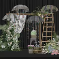 Elegant Floral Display with Arch Umbrella Decorations Green Plants and Fresh Flowers