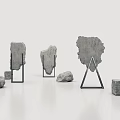 Modern Art Installation With Gray Stones And Metal Support Frames 3d model