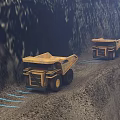 Three Yellow Dump Trucks Driving On Dirt Road In Mine Site