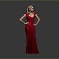 Woman in Red Long Dress Standing with Hands on Hips Against Gray Background