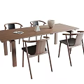 Modern Rectangular Wooden Dining Table Set With Four Dark Seated Chairs And Decorative Items 3d model