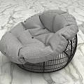 Round Gray Fabric Single Seater Sofa With Black Metal Wire Frame On Marble Floor
