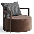 Round Brown Upholstered Single Sofa With Wooden Armrests And Black White Checkered Pillow