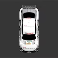 White Racing Car With Multiple Sponsor Logos And Rear Wing On Roof
