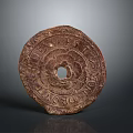Ancient Circular Stone Sculpture With Intricate Carvings Central Hole And Engraved Text