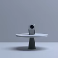 Modern Security Camera Placed on White Round Table with Gray Background
