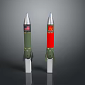 Two Green And Red Military Missiles With American North Korean Flags Displayed On White Bases