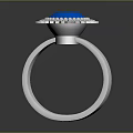 Intricately Sculpted Silver Ring With Blue Gemstone And Decorative Band Carvings