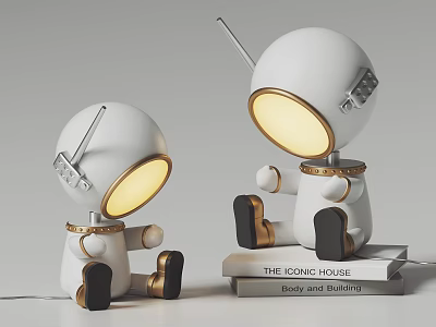 Cute Astronaut Table Lamp With White Body And Gold Accents Sitting On Books 3d model