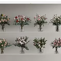 Vibrant Flower Arrangements In Clear Glass Vases On Layered Shelves