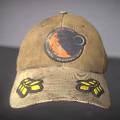 Vintage Brown Cotton Hat with Circular Badge and Yellow Leaf Patch