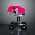 Mechanical Weapon With Pink Curved Top Black Base And Moving Wheels