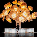 Illuminated Flower Tree Landscape Sculpture with Glowing Blossoms White Platform Base and Seated Person