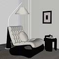Modern Lounge Chair With Plush Cushion Floor Lamp Framed Art And Side Table In Interior