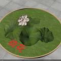 White Lotus Flower With Pink Edged Petals And Green Leaves On Green Grass