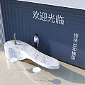 Modern Reception Desk With Marble Top White Stools Blue Wall And Welcome Sign Interior Design