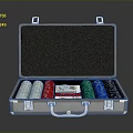 Silver Open Metal Case With Colored Poker Chips And Playing Cards