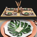 Elegant Dining Table Setup With Leaf Pattern Plates Copper Cutlery And Glass Cups