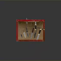 Various Knives Displayed On Red Chair Backrest With Target Pattern Design