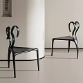 Modern Black Dining Chairs With Curved Backrest Design In Minimalist Interior
