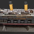 Vintage Ocean Liner Ship Model Featuring Yellow Funnels Multiple Decks And Hull Details
