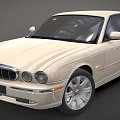 Beige Luxury Sedan XJ Model With Sleek Design And Chrome Grille