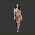 Stylish Woman in Beige Top and Orange Wrap Skirt Walking Against Gray Background