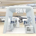 SEMR Shopping Mall Store With White Inflatable Structure Glass Windows Mannequins And Clothing Displays