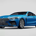 Blue BMW M8 Coupe With Black Roof Sporty Design And Alloy Wheels