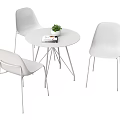 Modern White Dining Table Set With Round Table Three Chairs Potted Plant And Magazine