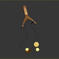 Orange And Black Slingshot With Rubber Band And Yellow Marbles Design