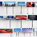 Various Outdoor Billboards With Different Brand Logos And Colorful Designs