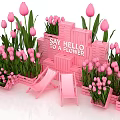 Pink Tulip Flower Displays in Wooden Planters with Deck Chairs and Hello Sign
