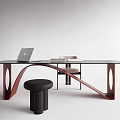 Modern Office Desk With Black Tabletop Red Curved Frame Laptop Beige Chair And Black Stool