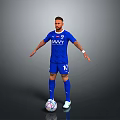 Football Player in Blue BAVVY Jersey Number 10 Stands with Football Against Gray Background